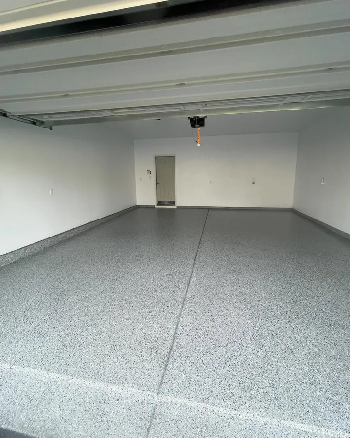 Gray flake epoxy garage floor by Crotti's Painting.